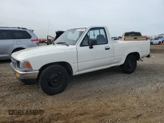 1993 Toyota Pickup DX with VIN JT4RN81P4P5168613, listed as a Copart auction lot 82611524 with 200,408 mi miles and Clean Title. Bid and sale history available at DreamBid. Image 1.