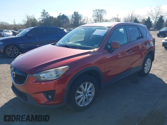 2013 Mazda CX-5 Touring with VIN JM3KE4CE7D0165324, listed as a IAAI auction lot 41879800 with 31,912 mi miles. Bid and sale history available at carsss.com. Image 2.