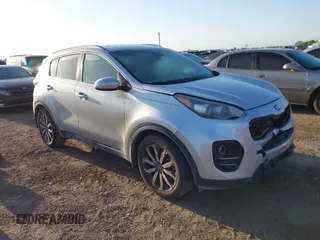 2017 Kia Sportage EX z VIN KNDPN3AC9H7205829, wystawiony jako IAAI lot #41990631 z przebiegiem 145 772 mil mil oraz . Historia ofert i sprzedaży dostępna na DreamBid. Obrazek 1.