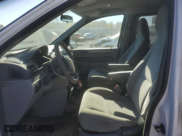 2007 Ford Freestar Cargo z VIN 2FTZA546X7BA14996, wystawiony jako Copart lot #76115294 z przebiegiem 107 450 mil mil oraz Szkody całkowita. Historia ofert i sprzedaży dostępna na DreamBid. Obrazek 7.