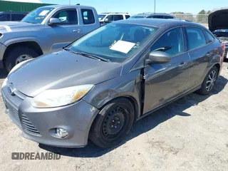 2012 Ford Focus SE with VIN 1FAHP3F2XCL433827, listed as a IAAI auction lot 41843960 with 156,343 mi miles. Bid and sale history available at carsss.com. Image 2.