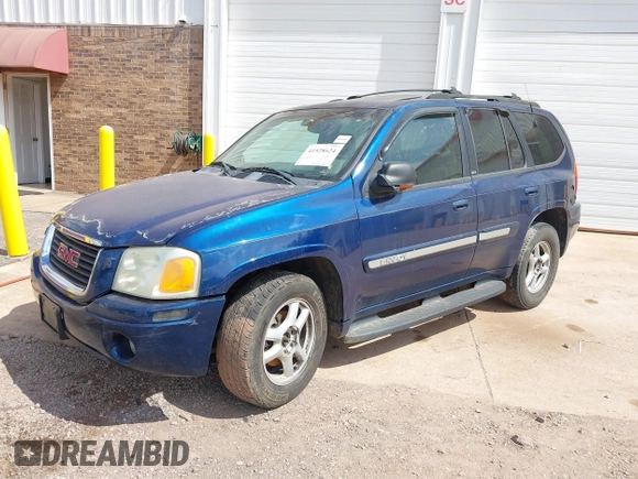 2002 GMC Envoy SLT with VIN 1GKDT13S322515582, listed as a IAAI auction lot 41528624 with 258,904 mi miles. Bid and sale history available at carsss.com. Image 2.