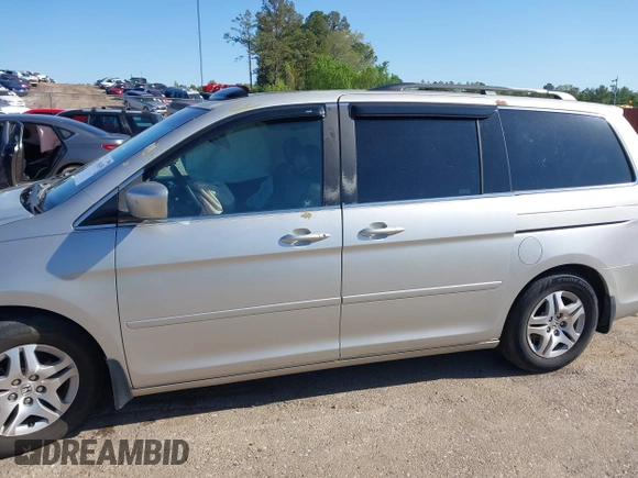 2005 Honda Odyssey EX-L z VIN 5FNRL38715B014905, wystawiony jako IAAI lot #41986395 z przebiegiem 191 029 mil mil oraz . Historia ofert i sprzedaży dostępna na DreamBid. Obrazek 18.