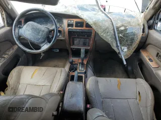 1997 Toyota 4Runner SR5 z VIN JT3HN86R4V0073022, wystawiony jako Copart lot #57112245 z przebiegiem 220 732 mil mil oraz Szkoda całkowita • Salvage title. Historia ofert i sprzedaży dostępna na DreamBid. Obrazek 8.
