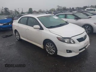 2010 Toyota Corolla with VIN 2T1BU4EEXAC413978, listed as a IAAI auction lot 41953898 with 121,676 mi miles. Bid and sale history available at carsss.com. Image 1.