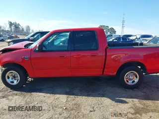 2003 Ford F-150 XLT with VIN 1FTRW07L03KC47484, listed as a IAAI auction lot 41653389 with 283,296 mi miles. Bid and sale history available at carsss.com. Image 14.