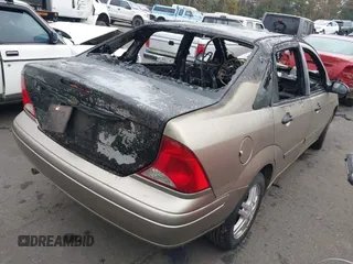 2004 Ford Focus SE with VIN 1FAFP34Z74W147182, listed as a IAAI auction lot 41462551 with Not Provided miles and . Bid and sale history available at DreamBid. Image 4.