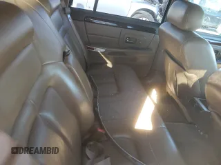 1999 Cadillac DeVille DHS z VIN 1G6KE54Y5XU721363, wystawiony jako Copart lot #79227924 z przebiegiem Nie podano mil oraz Szkoda całkowita • Salvage title. Historia ofert i sprzedaży dostępna na DreamBid. Obrazek 10.