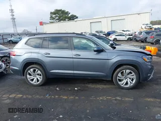 2021 Volkswagen Atlas SE z VIN 1V2WR2CA0MC585259, wystawiony jako IAAI lot #41525783 z przebiegiem 80 101 mil mil oraz . Historia ofert i sprzedaży dostępna na DreamBid. Obrazek 13.
