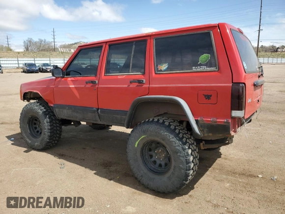 1999 Jeep Cherokee Sport with VIN 1J4FF68S6XL574980, listed as a Copart auction lot 51639635 with 257,854 mi miles and Salvage Title. Bid and sale history available at carsss.com. Image 2.