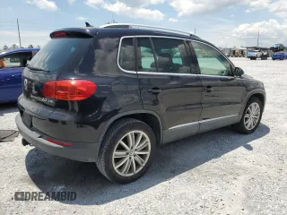 2014 Volkswagen Tiguan SE z VIN WVGAV3AX8EW613762, wystawiony jako Copart lot #61385765 z przebiegiem 167 278 mil mil oraz Czysty tytuł • Clean title. Historia ofert i sprzedaży dostępna na DreamBid. Obrazek 3.