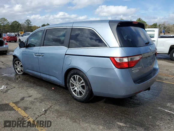 2013 Honda Odyssey EX z VIN 5FNRL5H40DB051489, wystawiony jako Copart lot #41862515 z przebiegiem 172 966 mil mil oraz Szkody całkowita. Historia ofert i sprzedaży dostępna na DreamBid. Obrazek 2.