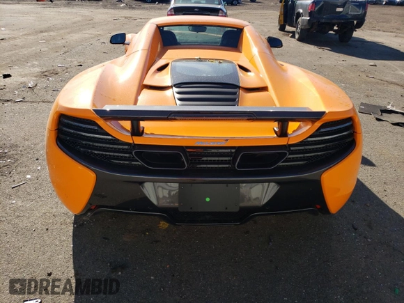 2015 McLaren 650S z VIN SBM11FAA4FW005016, wystawiony jako Copart lot #39770864 z przebiegiem Nie podano mil oraz . Historia ofert i sprzedaży dostępna na DreamBid. Obrazek 6.