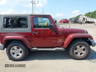 2007 Jeep Wrangler Sahara with VIN 1J8FA54157L203426, listed as a IAAI auction lot 42722278 with 168,756 mi miles and . Bid and sale history available at DreamBid. Image 13.