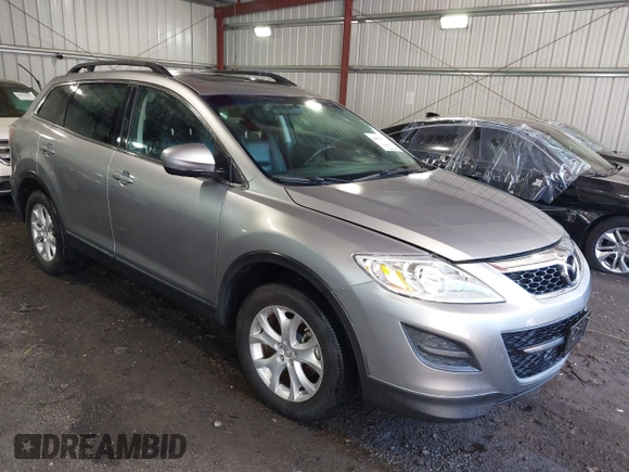 2011 Mazda CX-9 Touring with VIN JM3TB3CV6B0307358, listed as a IAAI auction lot 41979197 with 128,471 mi miles. Bid and sale history available at carsss.com. Image 1.