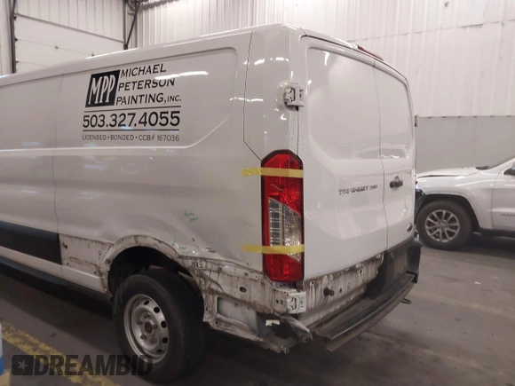 2020 Ford Transit Cargo with VIN 1FTBR1Y81LKA74678, listed as a IAAI auction lot 41173381 with 39,137 mi miles and . Bid and sale history available at DreamBid. Image 6.