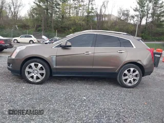 2014 Cadillac SRX Performance Collection with VIN 3GYFNCE33ES570472, listed as a IAAI auction lot 41971511 with 200,811 mi miles. Bid and sale history available at carsss.com. Image 14.