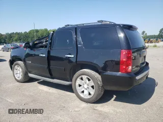2010 GMC Yukon SLT with VIN 1GKUCCE04AR285385, listed as a Copart auction lot 67070084 with 166,401 mi miles and Salvage Title. Bid and sale history available at carsss.com. Image 2.