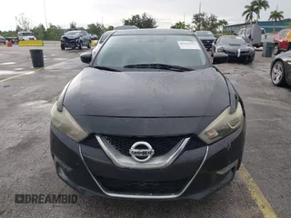 2016 Nissan Maxima SR with VIN 1N4AA6AP9GC428938, listed as a IAAI auction lot 42419663 with 121,501 mi miles and . Bid and sale history available at DreamBid. Image 6.