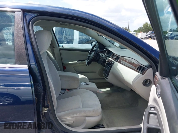 2012 Chevrolet Impala LS Retail with VIN 2G1WA5E3XC1187904, listed as a IAAI auction lot 42535156 with 143,790 mi miles and . Bid and sale history available at DreamBid. Image 5.