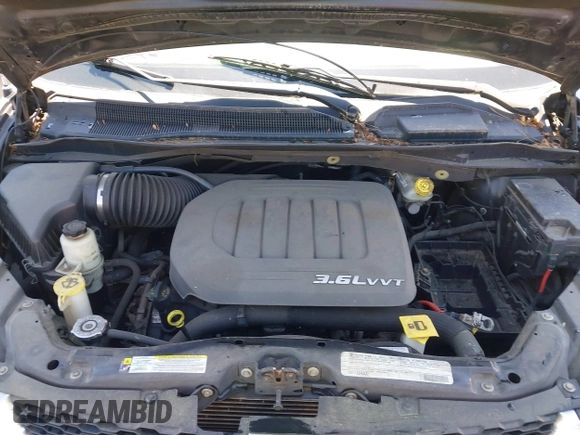 2012 Dodge Grand Caravan SXT with VIN 2C4RDGCG8CR247824, listed as a IAAI auction lot 42210397 with 200,919 mi miles and . Bid and sale history available at DreamBid. Image 10.