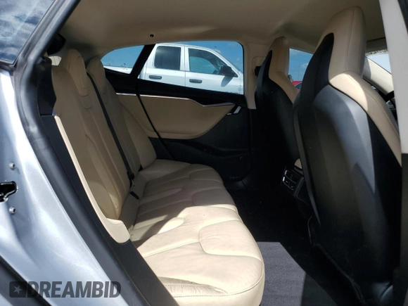 2014 Tesla Model S 60 with VIN 5YJSA1S14EFP44162, listed as a Copart auction lot 52943025 with Not Provided miles and Salvage Title. Bid and sale history available at DreamBid. Image 10.