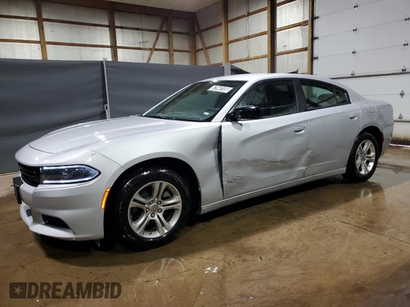 2023 Dodge Charger SXT z VIN 2C3CDXBG0PH630809, wystawiony jako Copart lot #57946105 z przebiegiem 50 749 mil mil oraz Tytuł czysty. Historia ofert i sprzedaży dostępna na DreamBid. Obrazek 1.