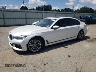 2019 BMW 7 Series 750i with VIN WBA7F0C55KGM24513, listed as a Copart auction lot 61728595 with 26,303 mi miles and Salvage title. Bid and sale history available at DreamBid. Image 1.