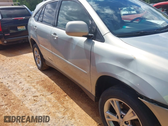 2006 Lexus RX 400h z VIN JTJHW31U960006826, wystawiony jako IAAI lot #42231108 z przebiegiem 319 742 mil mil oraz . Historia ofert i sprzedaży dostępna na DreamBid. Obrazek 12.