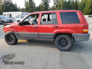 1996 Jeep Grand Cherokee z VIN 1J4EZ58Y5TC142263, wystawiony jako Copart lot #70532894 z przebiegiem Nie podano mil oraz Szkoda całkowita • Salvage title. Historia ofert i sprzedaży dostępna na DreamBid. Obrazek 2.
