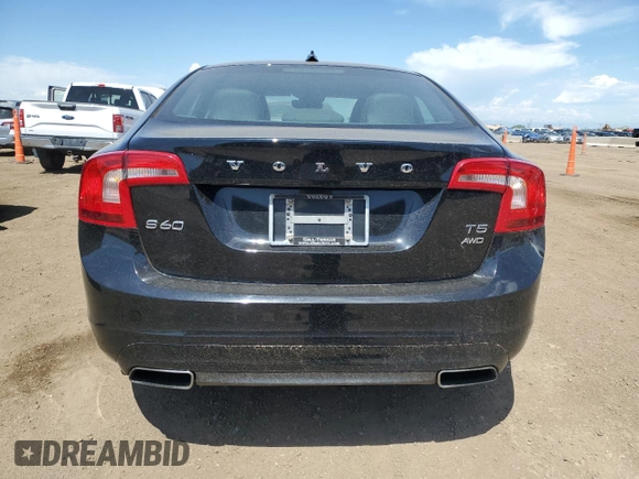 2016 Volvo S60 T5 Premier with VIN YV1612TKXG2402195, listed as a Copart auction lot 60140015 with 105,540 mi miles and Salvage title. Bid and sale history available at DreamBid. Image 6.