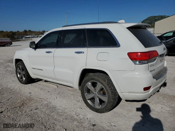 2014 Jeep Grand Cherokee Overland with VIN 1C4RJFCT5EC209981, listed as a Copart auction lot 77758524 with 156,270 mi miles and Salvage Title. Bid and sale history available at carsss.com. Image 2.