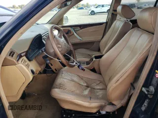 2001 Mercedes-Benz E-Class with VIN WDBJH65JX1B387291, listed as a Copart auction lot 79756824 with 261,205 mi miles and Salvage Title. Bid and sale history available at carsss.com. Image 7.