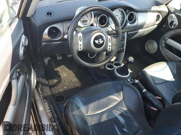 2003 MINI Hardtop S with VIN WMWRE33423TD67736, listed as a Copart auction lot 53428565 with 148,784 mi miles and Clean Title. Bid and sale history available at DreamBid. Image 8.