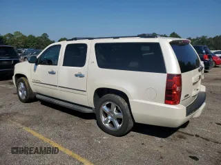 2013 Chevrolet Suburban LTZ with VIN 1GNSCKE03DR104530, listed as a Copart auction lot 74923234 with 230,803 mi miles and Clean Title. Bid and sale history available at carsss.com. Image 2.