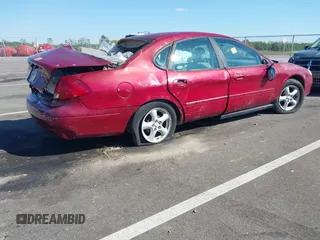 2003 Ford Taurus SE Standard with VIN 1FAFP53U93A240461, listed as a IAAI auction lot 37581480 with 200,000 mi miles. Bid and sale history available at carsss.com. Image 4.