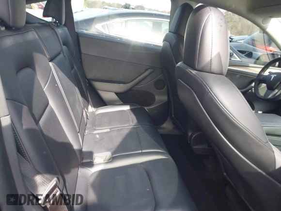 2023 Tesla Model Y Long Range z VIN 7SAYGAEE5PF603128, wystawiony jako IAAI lot #41328797 z przebiegiem 63 527 mil mil oraz . Historia ofert i sprzedaży dostępna na DreamBid. Obrazek 8.