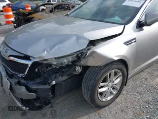 2012 Kia Optima LX with VIN KNAGM4A78C5283175, listed as a IAAI auction lot 42075886 with 123,112 mi miles and . Bid and sale history available at carsss.com. Image 6.