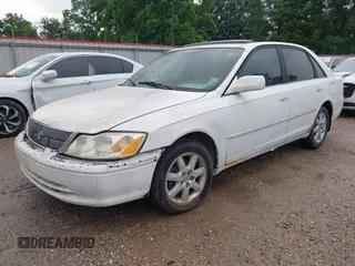 2001 Toyota Avalon XL z VIN 4T1BF28B31U182971, wystawiony jako IAAI lot #42276391 z przebiegiem 226 582 mil mil oraz . Historia ofert i sprzedaży dostępna na DreamBid. Obrazek 2.