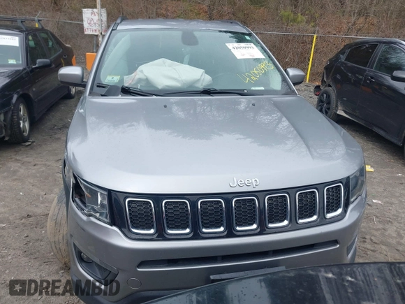 2018 Jeep Compass Altitude with VIN 3C4NJDBB1JT435428, listed as a IAAI auction lot 42050993 with 114,328 mi miles and . Bid and sale history available at DreamBid. Image 12.