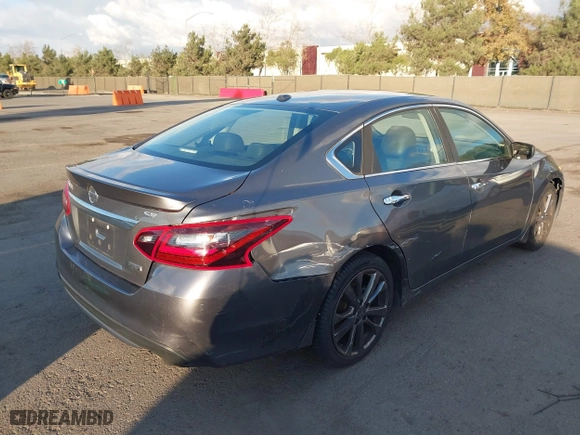 2018 Nissan Altima 2.5 SV with VIN 1N4AL3AP0JC136126, listed as a IAAI auction lot 41431759 with 170,825 mi miles. Bid and sale history available at carsss.com. Image 4.