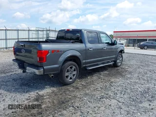 2018 Ford F-150 XL with VIN 1FTEW1E50JFD58356, listed as a IAAI auction lot 42456741 with 153,332 mi miles and . Bid and sale history available at DreamBid. Image 4.