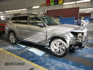 2022 Volkswagen Atlas SE with VIN 1V2LP2CAXNC564655, listed as a Copart auction lot 87390464 with 74,201 mi miles and Salvage title. Bid and sale history available at DreamBid. Image 4.