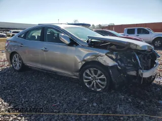 2014 Hyundai Azera с VIN KMHFG4JG6EA354742, выставлен на аукционе Copart как лот 48163345 с пробегом 104 983 миль миль и Списание • Salvage title. История ставок и продаж доступна на DreamBid. Изображение 4.
