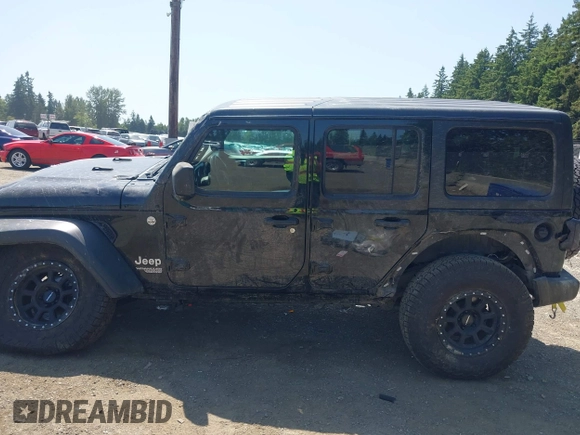 2018 Jeep Wrangler Unlimited Sport S with VIN 1C4HJXDN1JW216825, listed as a IAAI auction lot 42405799 with 37,194 mi miles and . Bid and sale history available at DreamBid. Image 14.
