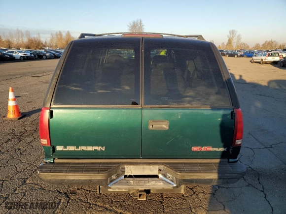 1997 GMC Suburban with VIN 3GKFK16RXVG513571, listed as a Copart auction lot 82086924 with 190,142 mi miles and Salvage Title. Bid and sale history available at carsss.com. Image 6.
