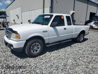 2011 Ford Ranger XLT with VIN 1FTLR4EE7BPB13520, listed as a Copart auction lot 61282365 with 127,111 mi miles and Salvage title. Bid and sale history available at DreamBid. Image 1.