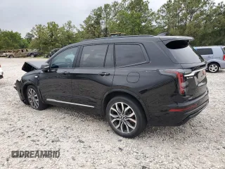 2023 Cadillac XT6 AWD Sport z VIN 1GYKPGRS6PZ126039, wystawiony jako Copart lot #55948605 z przebiegiem 39 966 mil mil oraz Szkoda całkowita • Salvage title. Historia ofert i sprzedaży dostępna na DreamBid. Obrazek 2.