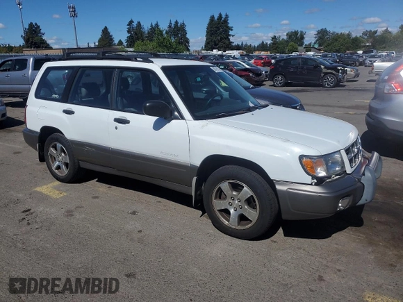 1999 Subaru Forester S with VIN JF1SF6557XH703160, listed as a Copart auction lot 60076974 with 0 mi miles and Salvage Title. Bid and sale history available at carsss.com. Image 4.