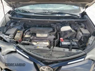 2018 Toyota RAV4 XLE with VIN 2T3WFREV2JW409292, listed as a Copart auction lot 61577355 with 189,258 mi miles and Salvage title. Bid and sale history available at DreamBid. Image 12.